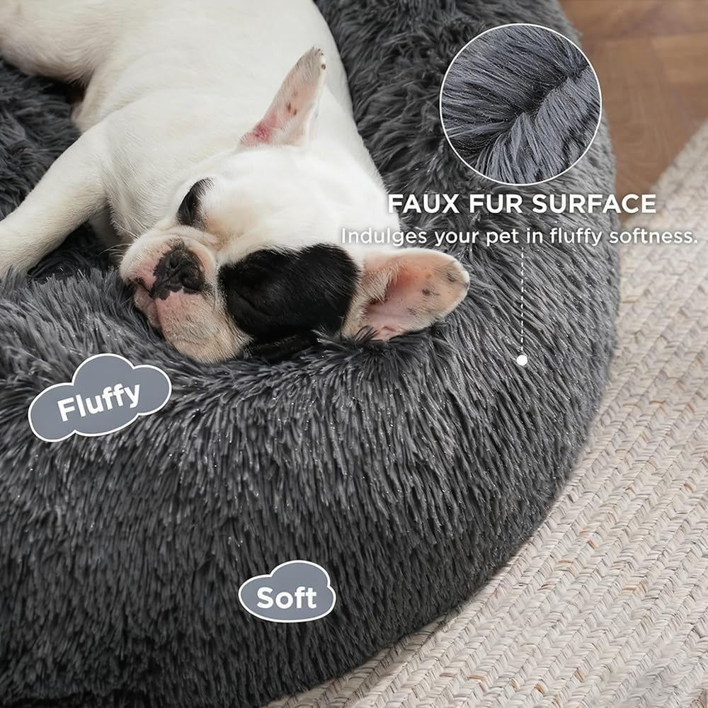 Dog sleeping in Topika Calming Donut Bed